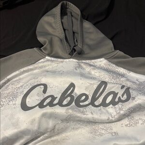 Cabela's Gray and White Pullover with center hoodie pocket.